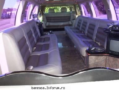 masini modelul mai sus limuzina) este cadillac escalade. iar interiorul arata ceva gen: